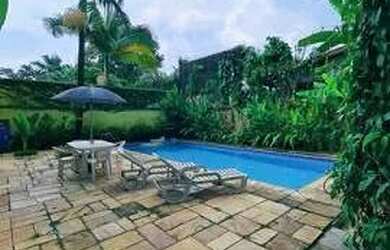 Imagem: A casa possui 3 Dormitórios, 2 Banheiros, 4 Vagas na garagem