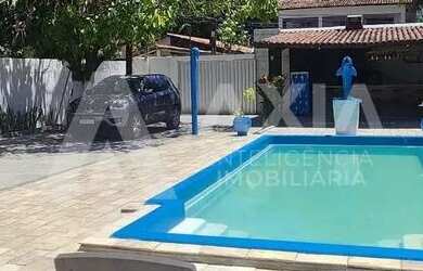 Imagem: A casa possui 5 Dormitórios, 5 Banheiros, 4 Vagas na garagem
