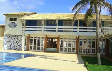 Imagem: A casa possui 5 Dormitórios, 5 Banheiros, 5 Vagas na garagem