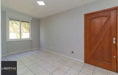 Imagem: O apartamento possui 3 Dormitórios, 1 Banheiro, 1 Vaga na garagem