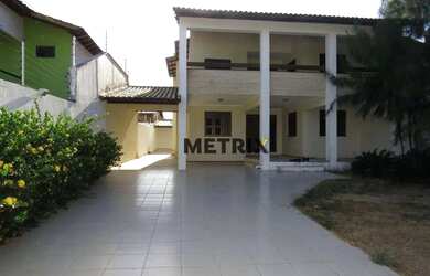 Imagem: A casa possui 4 Dormitórios, 5 Banheiros, 5 Vagas na garagem