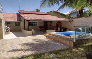 Imagem: A casa possui 5 Dormitórios, 3 Banheiros, 3 Vagas na garagem