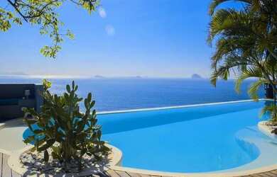 Imagem 3: Casa Cinematográfica entre o mar e montanha no Joá