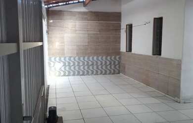 Imagem: A casa possui 3 Dormitórios, 2 Banheiros, 3 Vagas na garagem