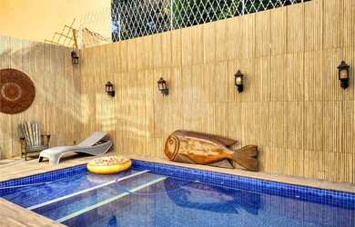 Imagem: A casa possui 2 Dormitórios, 4 Banheiros, 3 Vagas na garagem