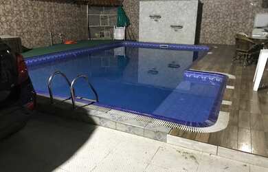 Imagem: A casa possui 4 Dormitórios, 3 Vagas na garagem e está localizado