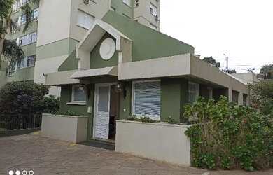 Imagem: O apartamento possui 3 Dormitórios, 1 Banheiro, 1 Vaga na garagem