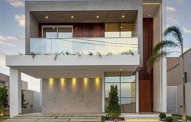 Imagem: A casa possui 3 Dormitórios, 3 Banheiros, 2 Vagas na garagem