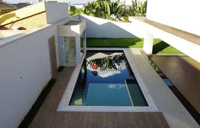 Imagem: A casa em condomínio possui 4 Dormitórios, 5 Banheiros, 4