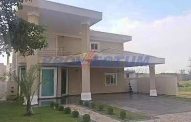 Imagem: A casa em condomínio possui 4 Dormitórios, 5 Banheiros, 4