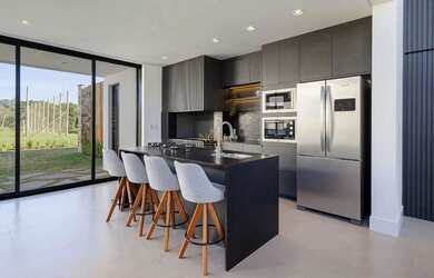 Imagem 11: Casa de condominio com concreto aparente