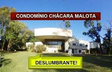 Imagem: A casa possui 5 Dormitórios, 5 Banheiros, 4 Vagas na garagem