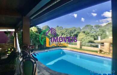 Imagem: A casa em condomínio possui 3 Dormitórios, 4 Banheiros, 2