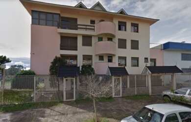 Imagem: O apartamento possui 3 Dormitórios, 1 Banheiro, 1 Vaga na garagem