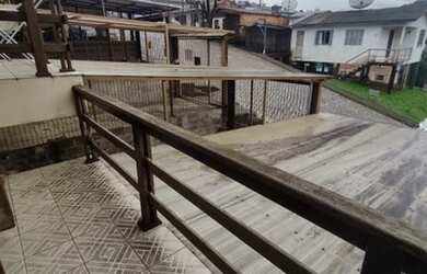 Imagem: A casa possui 2 Dormitórios, 1 Banheiro, 1 Vaga na garagem