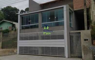 Imagem: A casa possui 5 Dormitórios, 2 Banheiros, 2 Vagas na garagem