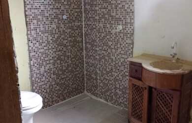 Imagem: A casa possui 2 Dormitórios, 1 Banheiro, 1 Vaga na garagem