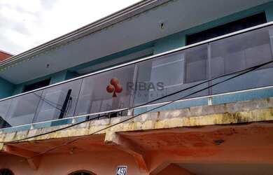 Imagem: A casa possui 5 Dormitórios, 1 Banheiro, 3 Vagas na garagem