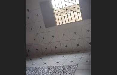 Imagem: A casa possui 2 Dormitórios e 1 Banheiro e está localizado