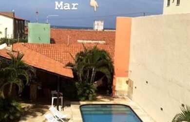 Imagem: A casa possui 4 Dormitórios, 5 Banheiros, 5 Vagas na garagem