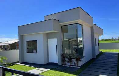 Imagem: A casa possui 3 Dormitórios, 1 Banheiro, 5 Vagas na garagem