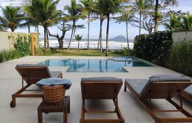 Imagem: A casa em condomínio e possui 5 Dormitórios, Suítes, 5 Banheiros