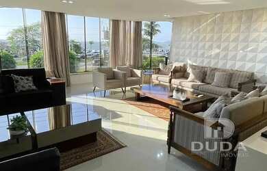 Imagem: O apartamento possui 4 Dormitórios, 5 Banheiros, 2 Vagas na