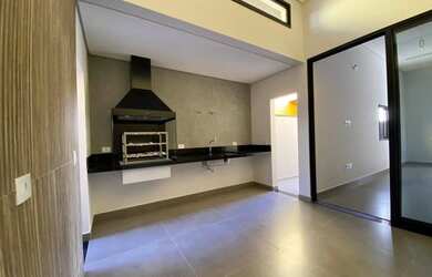 Imagem: A casa possui 3 Dormitórios, 4 Banheiros, 2 Vagas na garagem