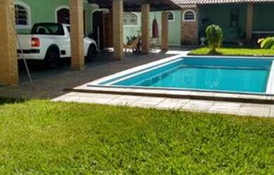 Imagem: A casa possui 3 Dormitórios, 1 Banheiro, 5 Vagas na garagem