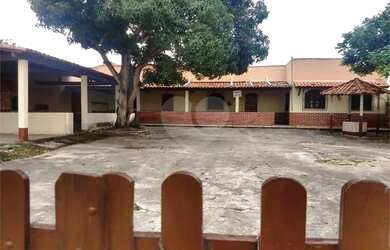 Imagem: A casa possui 3 Dormitórios, 1 Banheiro, 1 Vaga na garagem