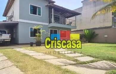 Imagem: A casa possui 5 Dormitórios, 4 Banheiros, 4 Vagas na garagem