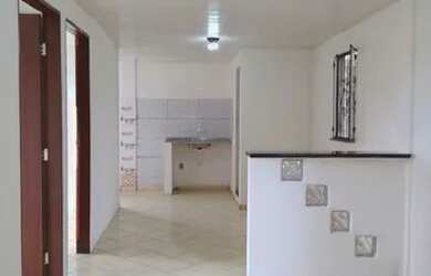 Imagem: A casa possui 3 Dormitórios, 1 Banheiro e está localizado