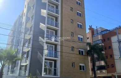 Imagem: O apartamento possui 2 Dormitórios, 1 Banheiro, 2 Vagas na