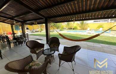 Imagem: A casa possui 3 Dormitórios, 5 Banheiros, 5 Vagas na garagem