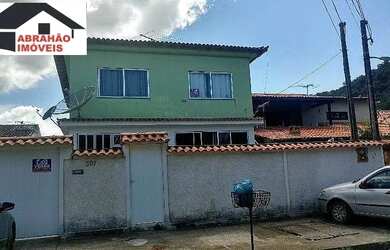 Imagem: A casa possui 5 Dormitórios, 3 Banheiros, 5 Vagas na garagem