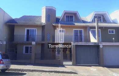 Imagem: A casa possui 3 Dormitórios, 2 Banheiros, 4 Vagas na garagem