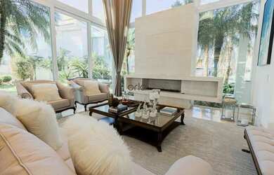 Imagem 3: Mansão beira lago com 8 suítes e piscina à venda, 953 m² - Condomínio...