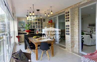 Imagem: O apartamento possui 3 Dormitórios, 5 Banheiros, 2 Vagas na