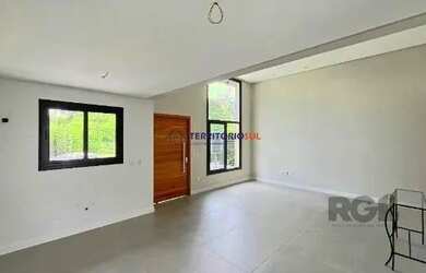 Imagem 5: Casa em Porto Alegre, no bairro Hípica, com 3 dormitório s , e 3 banheiros,...