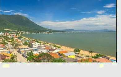 Imagem: A casa possui 2 Dormitórios, Acomodam 8 pessoas, 3 Vagas na