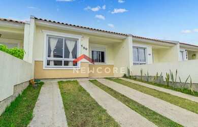 Imagem: A casa em condomínio possui 2 Dormitórios, 1 Banheiro, 2 Vagas