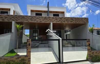 Imagem: A casa possui 3 Dormitórios, 2 Banheiros, 2 Vagas na garagem