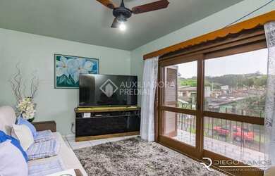 Imagem: A casa possui 5 Dormitórios, 5 Banheiros, 4 Vagas na garagem