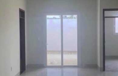 Imagem: A casa possui 2 Dormitórios, 1 Banheiro, 2 Vagas na garagem