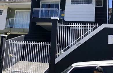 Imagem: A casa possui 3 Dormitórios, 3 Banheiros, 1 Vaga na garagem