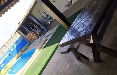 Imagem: A casa possui 2 Dormitórios, 3 Banheiros e 2 Vagas na garagem