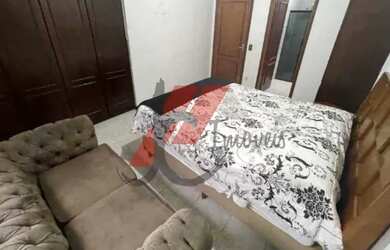 Imagem: A casa possui 3 Dormitórios, 2 Banheiros, 4 Vagas na garagem