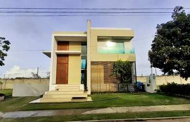 Imagem: A casa possui 4 Dormitórios, 5 Banheiros, 5 Vagas na garagem