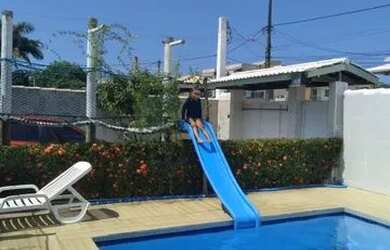 Imagem: A casa em condomínio possui 4 Dormitórios, 2 Banheiros, 3