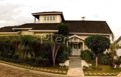 Imagem: A casa em condomínio possui 5 Dormitórios, 1 Banheiro, 5 Vagas